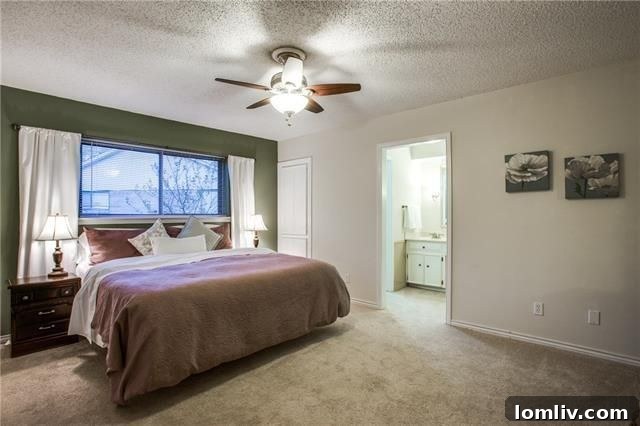 View of the covered patio leading to the expansive backyard