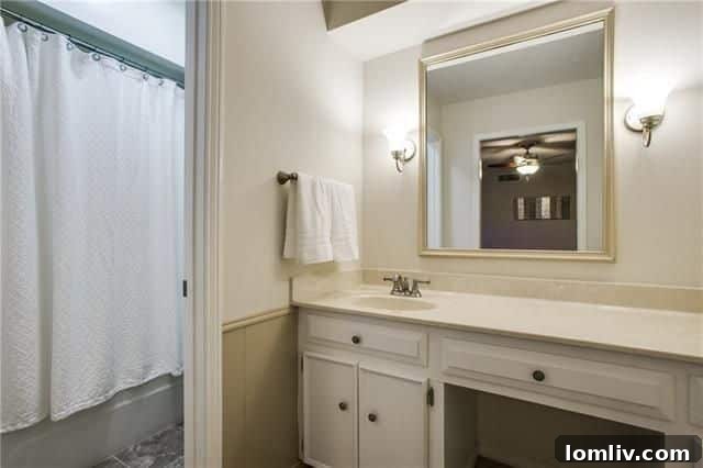 Well-maintained front yard with mature shrubbery