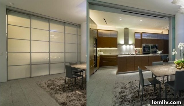 Flexible living space in an Azure home with a frosted glass wall separating kitchen/dining.