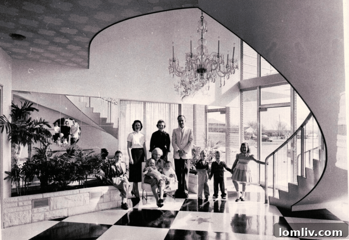 The Mayrath family in the grand entryway of their innovative mid-century modern home, late 1950s. Martin Mayrath, the inventor of the grain auger, commissioned this unique residence.