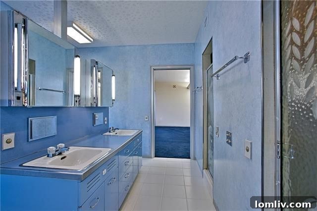 Expansive view of a room within the Mayrath House, revealing the spacious layout and vintage charm soon to be lost.