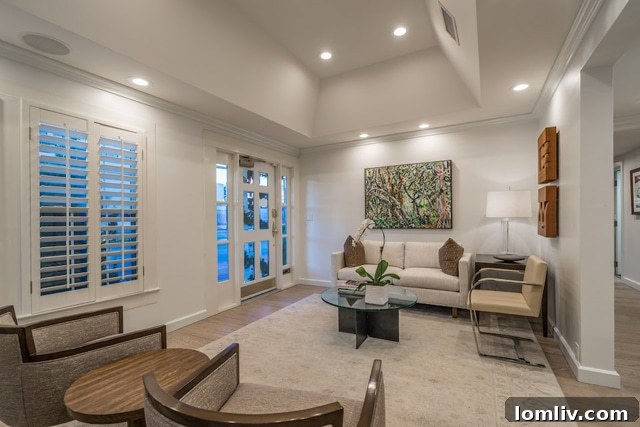 Modern conference room at Ebby Halliday Little White House, featuring sleek design and a large screen for presentations