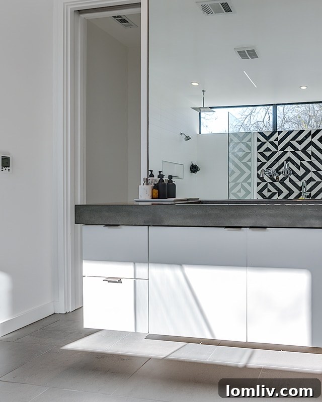 Elegant bathroom with contemporary fixtures and a minimalist design.