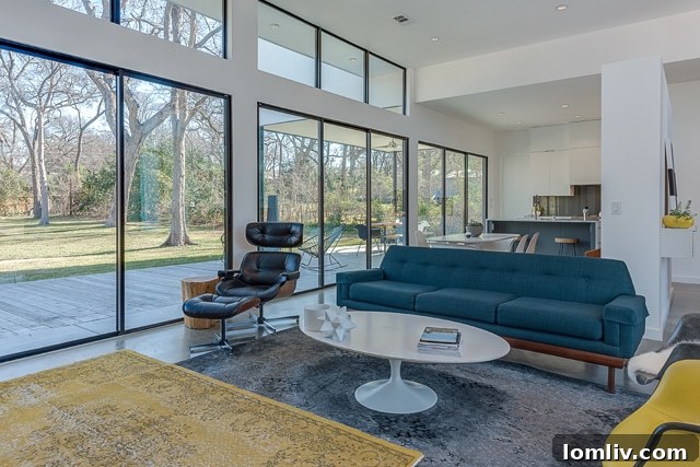 A stunning view of the kitchen and dining area, showcasing contemporary design and high-end appliances.