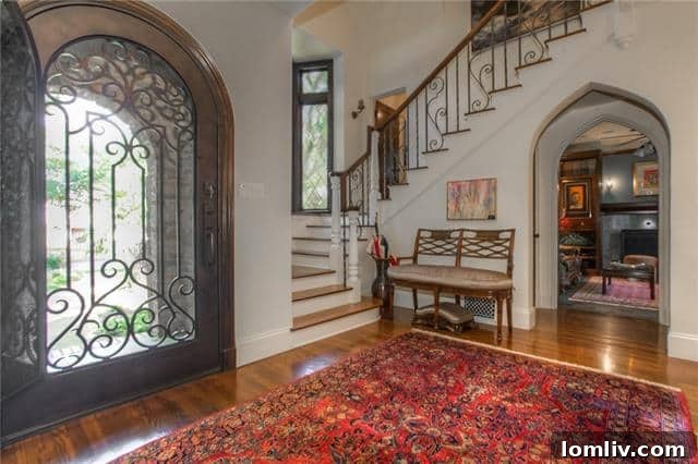 Historic Tudor Home Foyer with Stained Glass and Grand Staircase