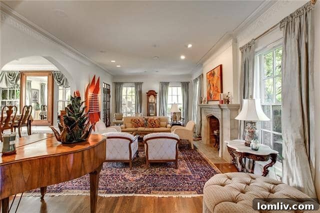 Spacious Living Room with Fireplace and Arched Openings
