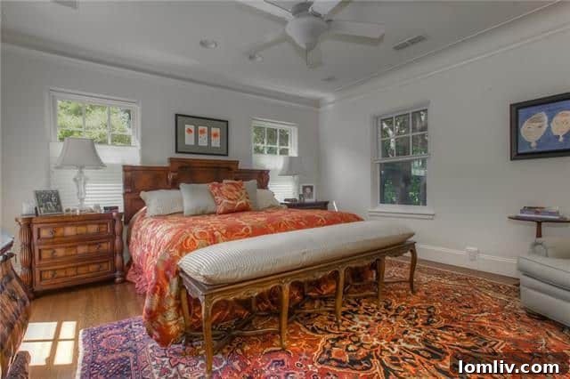 Master Bedroom Suite with Gothic Arch Door and Sitting Area