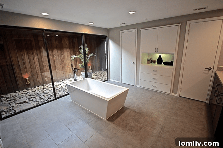 Kevin Twitty's Dream Reno Hits Market Wednesday 2 The luxurious master bathroom in Kevin and Brad Twitty's renovated 1970s ranch, showcasing elegant design and modern functionality.