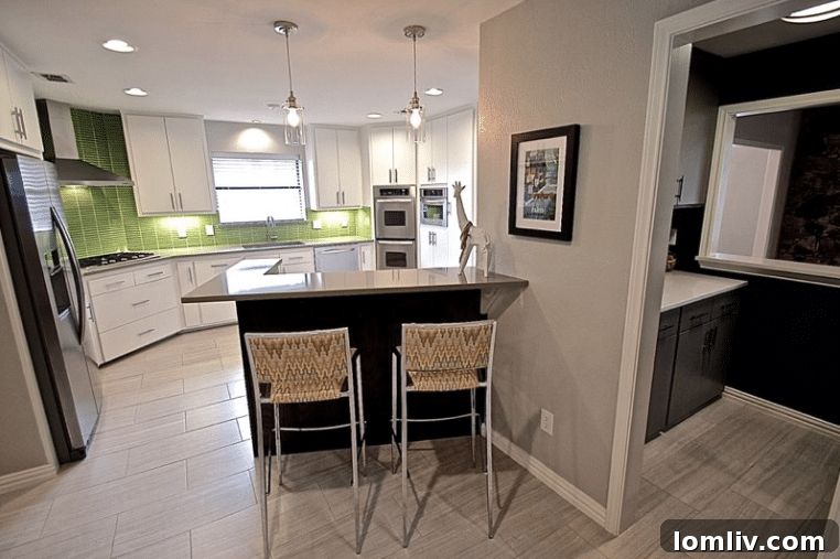 Kevin Twitty's Dream Reno Hits Market Wednesday 21 View of the kitchen island with vintage barstools reupholstered in unique fabric.