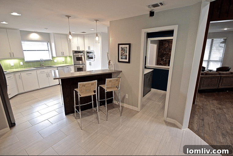 Kevin Twitty's Dream Reno Hits Market Wednesday 26 The kitchen's clean lines and modern design elements.