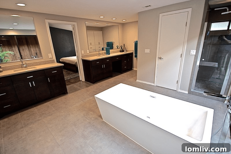 Kevin Twitty's Dream Reno Hits Market Wednesday 38 Custom rift-sawn white oak vanities with a java finish in the master bathroom.