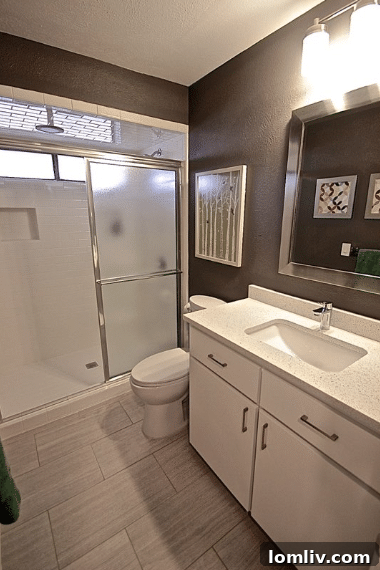 Kevin Twitty's Dream Reno Hits Market Wednesday 49 Detailed shot of the custom sectional in the main living area, showcasing texture and color.