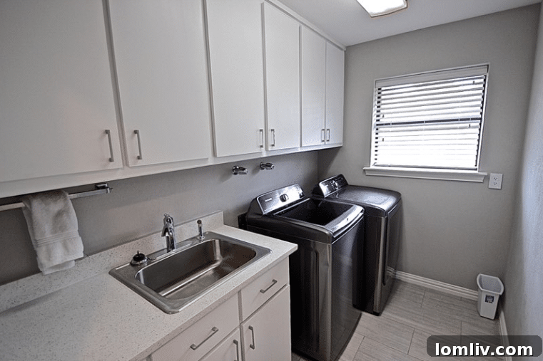 Kevin Twitty's Dream Reno Hits Market Wednesday 50 The dining room featuring the unique sputnik chandelier and modern dining set.