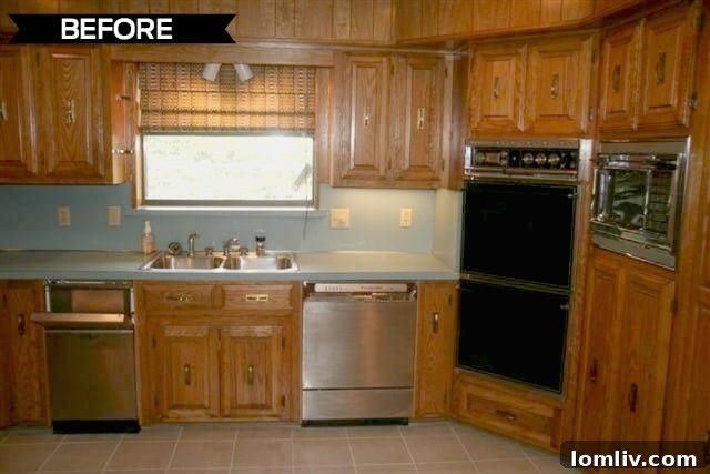 Kevin Twitty's Dream Reno Hits Market Wednesday 10 Another perspective of the kitchen before its modern overhaul, showing pale countertops.