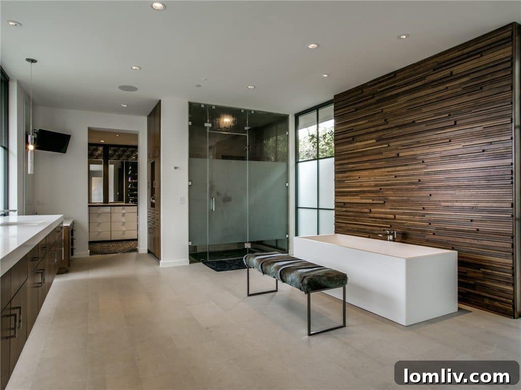 Spacious and highly organized master closet, showcasing bespoke storage solutions.