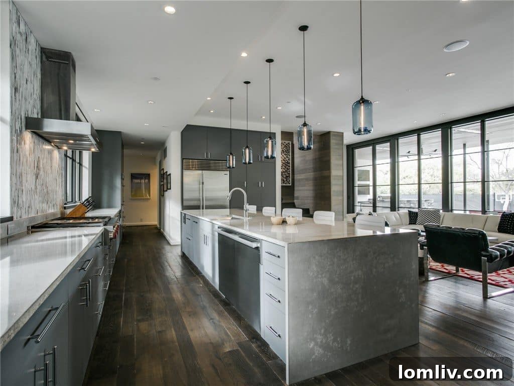 Detail shot of the modern kitchen with concrete countertops and sleek cabinetry.