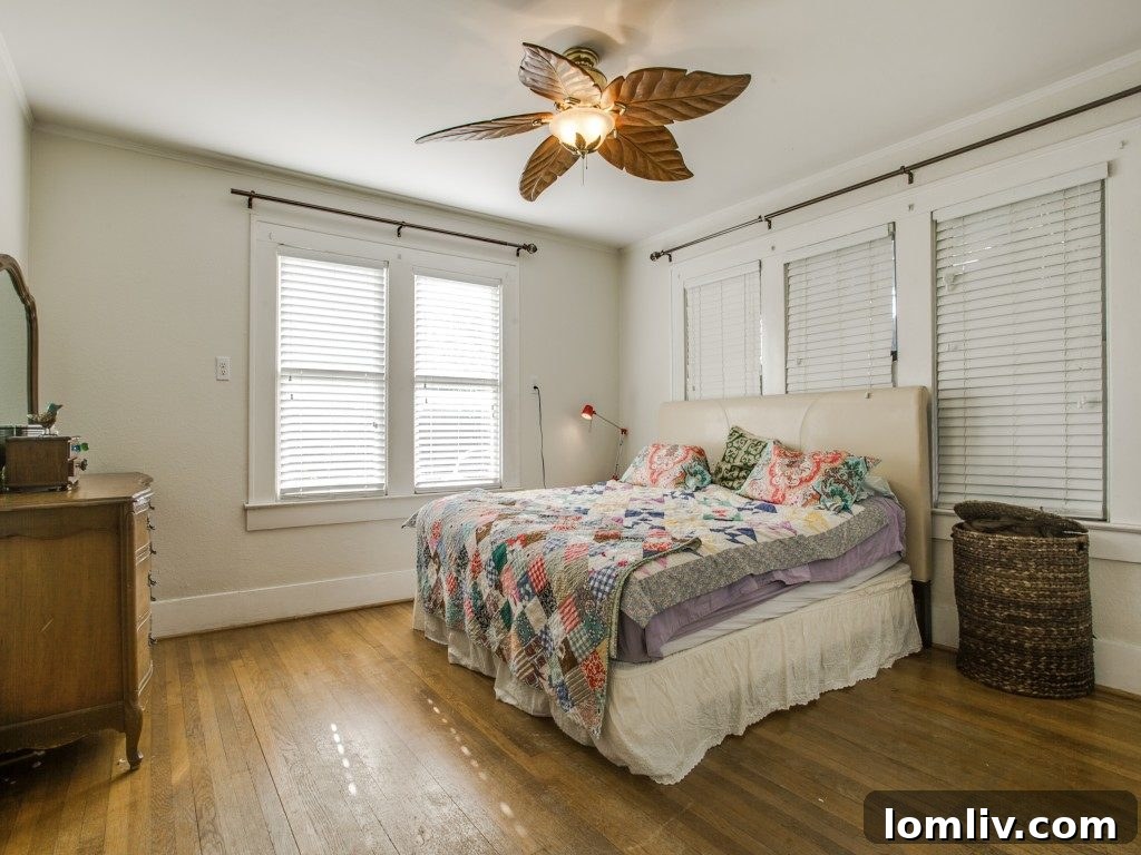 Positioning a bed directly in front of a bank of windows can be distracting and create draftiness, as highlighted by Felber in her staging advice.