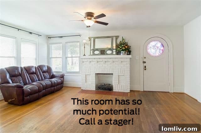 Empty living room of 307 N. Waverly Dr before professional staging