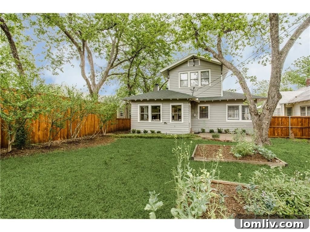 The charming exterior of the fully renovated Craftsman bungalow, ready for sale