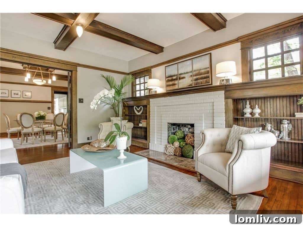 Newly painted porch with yellow accent doors on a historic Dallas home