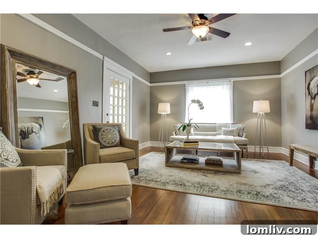 Cozy secondary living area with direct porch access in the Dallas bungalow