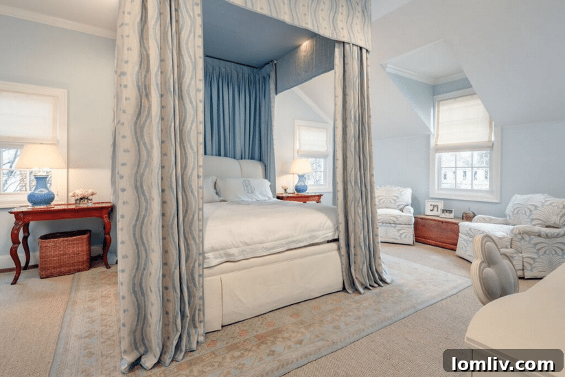 A luxurious bedroom featuring a statement headboard, elegant bedding, and designer accents.
