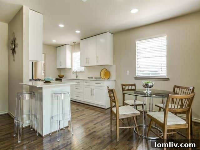 Love at First Sight: Dallas Open Houses This Weekend 20 Modern redesigned kitchen with white cabinets, quartz counters, and hexagon tile backsplash