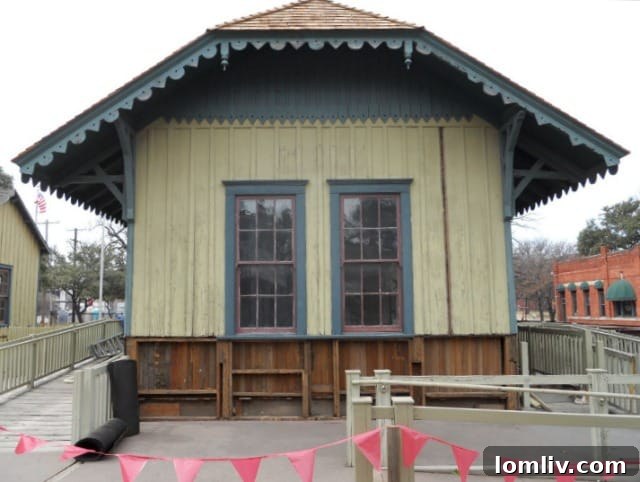 Ronald Siebler Honored with Prestigious Award, Hailed as Preservation's Man of the Hour 4 The MKT Depot at Dallas Heritage Village showing significant rot and termite damage on the lower board and batten siding before restoration.