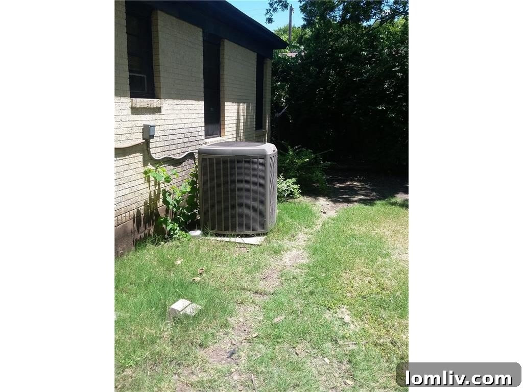 Newer HVAC unit visible on the side of the house at 655 Peavy Road, a positive functional feature
