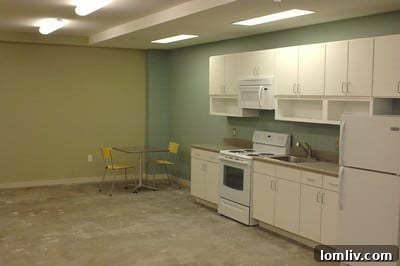 Tomorrow's Preservation Dallas Tour Features 511 N Akard Adaptive Reuse Marvel 3 Interior of a studio apartment at CityWalk@Akard, showcasing modern design and natural light.