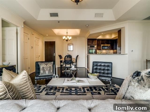 Spacious living room with city views in 5909 Luther Ln condo.