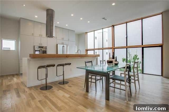 Open concept living area with hardwood floors at 3750 Colvin Ct.