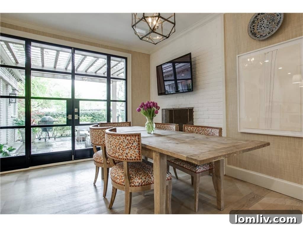 Greenway Parks Reimagined: A Designer's Modern Traditional Vision 12 Breakfast Nook with Crittall Doors and Fireplace