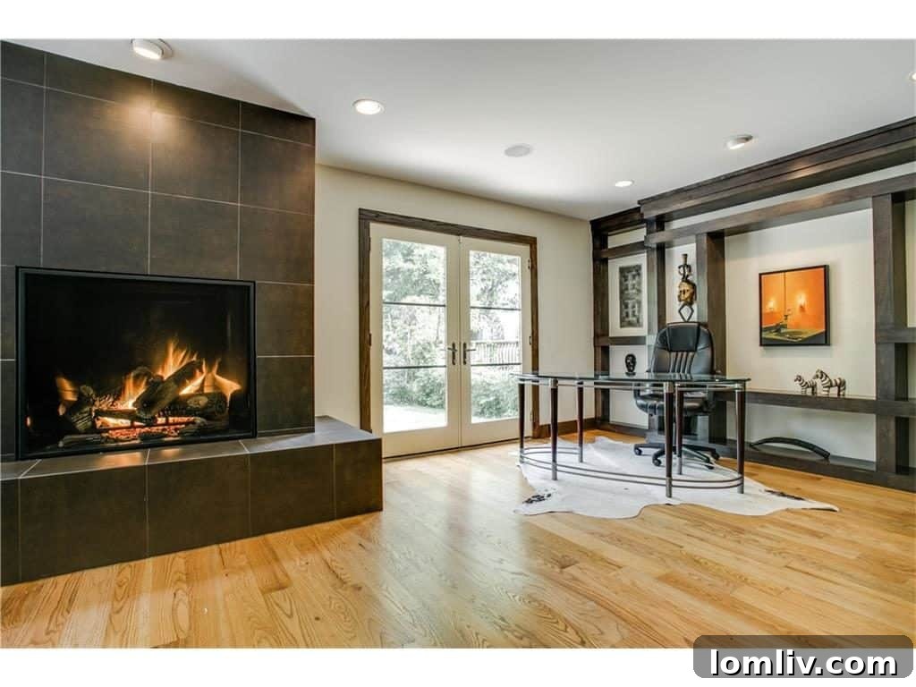 Spacious study offering serene views of the pool and greenbelt