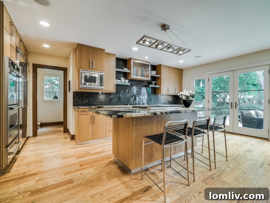 Gourmet kitchen featuring Bentwood bamboo cabinets, Viking appliances, and red oak floors