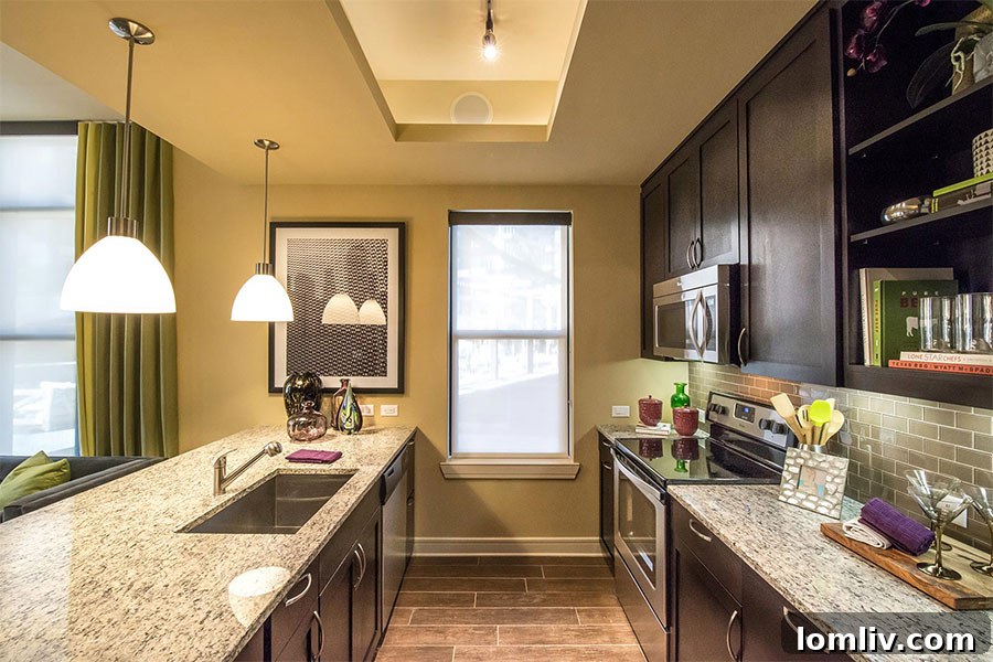Elegant dining area adjacent to the kitchen in a Taylor Luxury Apartment, perfect for entertaining