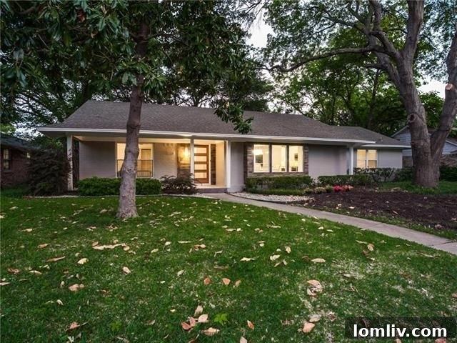 Contemporary traditional home in Sparkman Club Estates with welcoming front porch and excellent curb appeal.