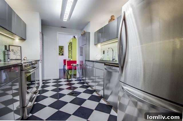 Bedroom with large windows offering expansive views of Turtle Creek and the Dallas skyline.