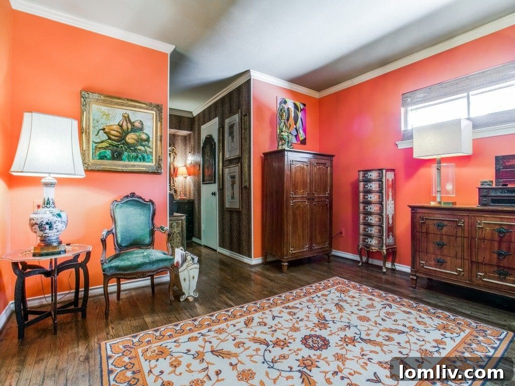 Elegant second bathroom with designer tile and sophisticated wallpaper, reflecting meticulous attention to detail and cohesive aesthetic