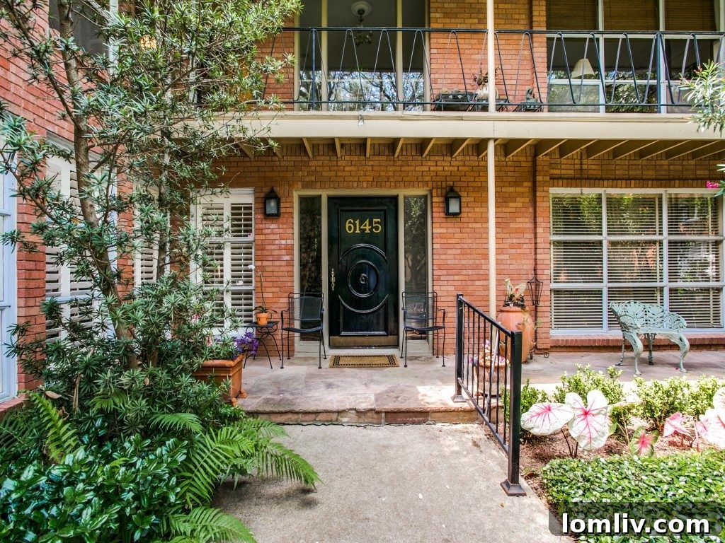 A bright and spacious Midcentury Modern living room in Dallas, featuring hardwood floors, large windows, and a comfortable seating arrangement