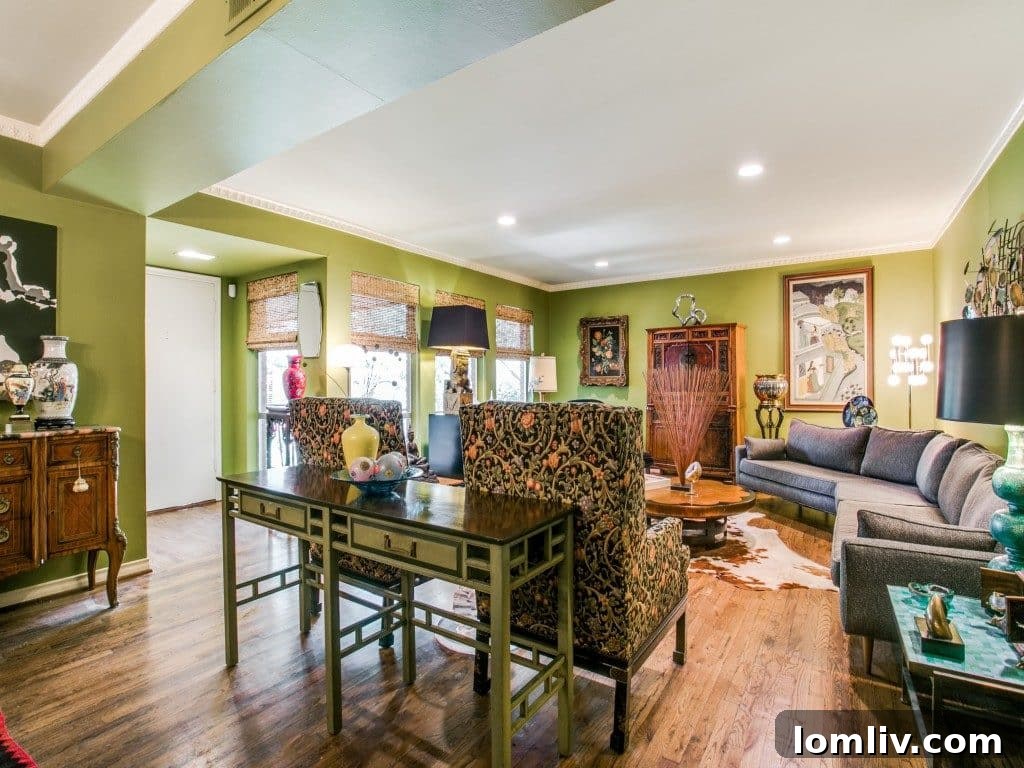 Elegant modern dining area with a stylish chandelier and ample space for entertaining guests in the Park Sovereign unit