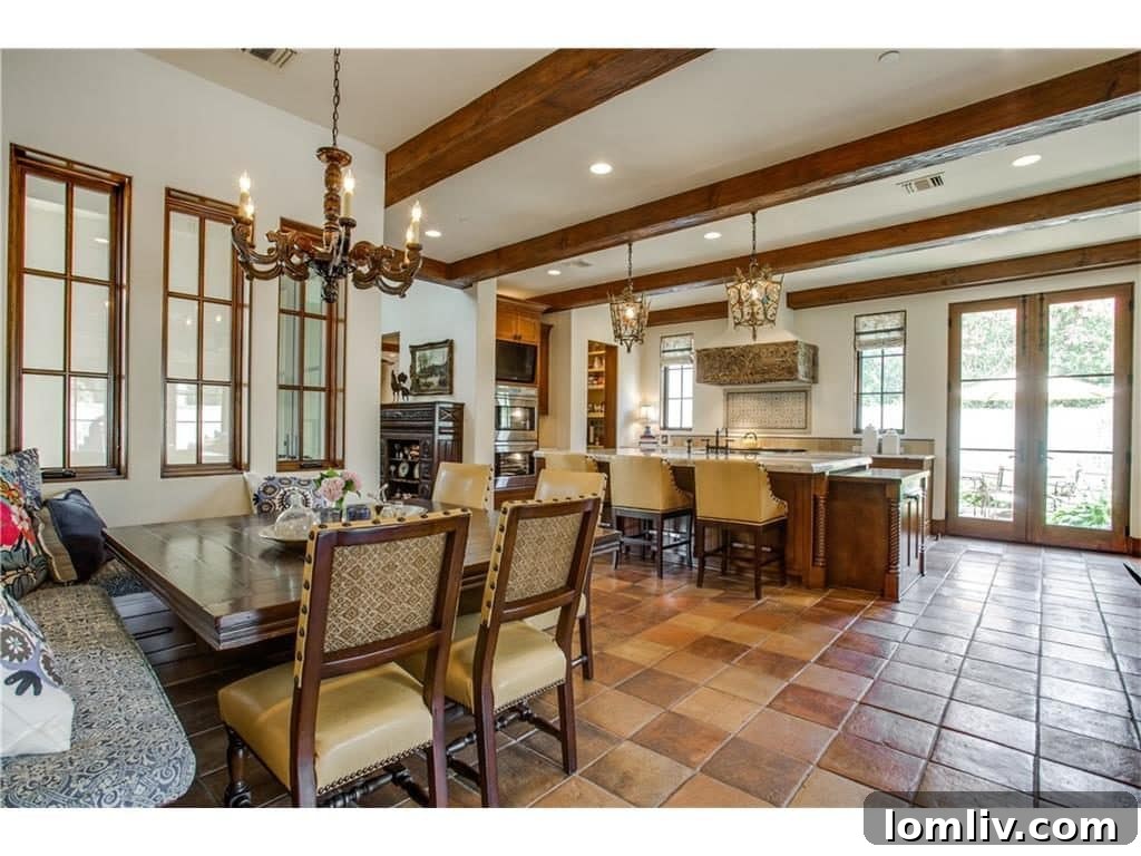 Gourmet Kitchen with Custom Wood Carved Range Hood