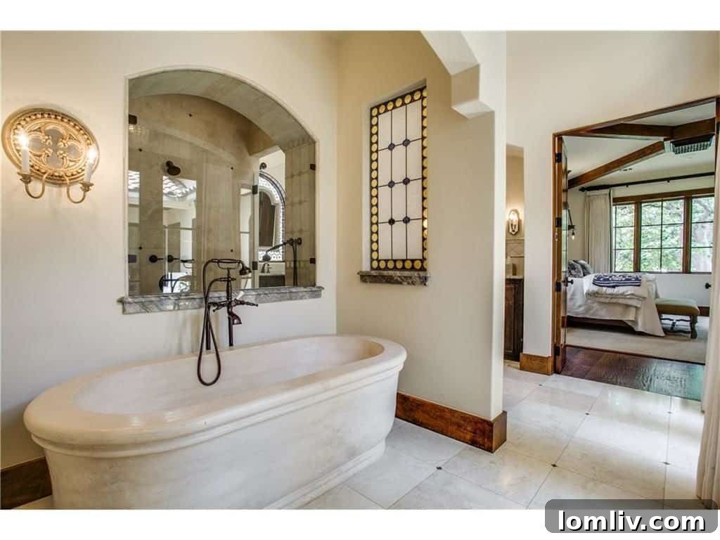 Spa-Like Master Bathroom with Honed Limestone Bathtub