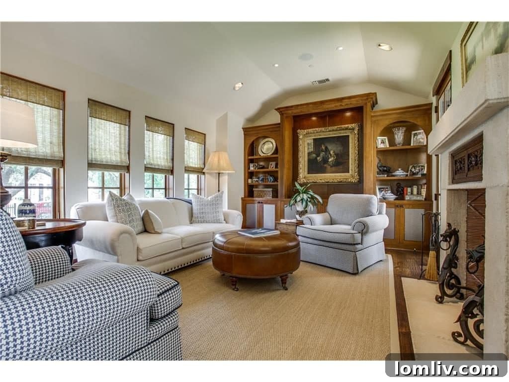 Luxurious Family Room with Custom Limestone Fireplace