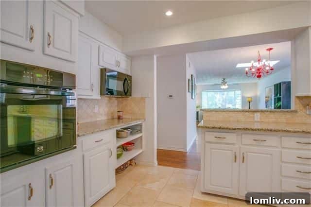 Bathroom with distinct retro green tiling and classic sink