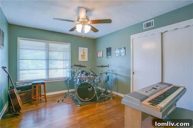 View towards the bright sunroom from the main living area