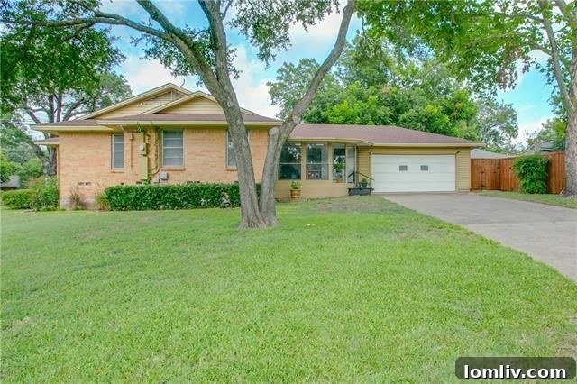 Interior view of the living area showcasing a retro chandelier and hardwood floors