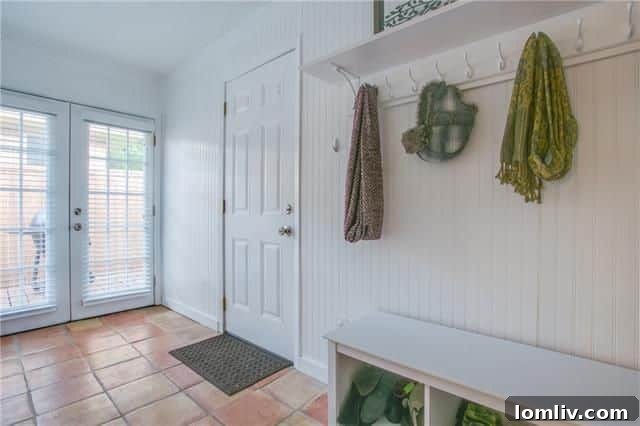 Kitchen sink area with modern fixtures and bright window