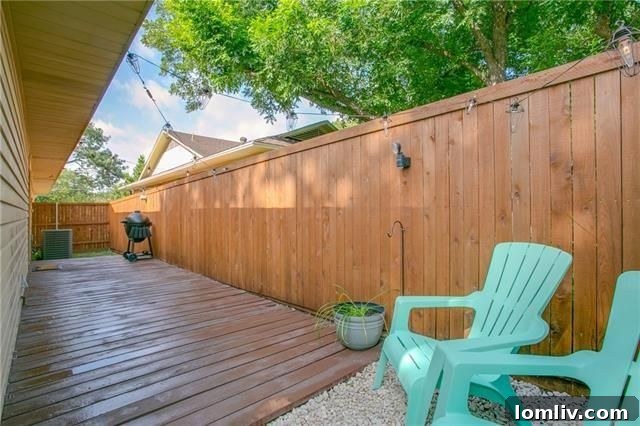 Exterior view showing the corner lot and attractive landscaping