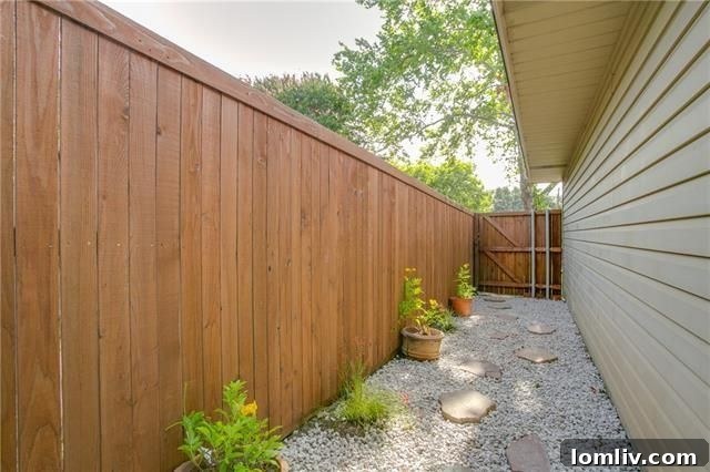 Front exterior of 1925 Province Lane with mature trees, showcasing its curb appeal